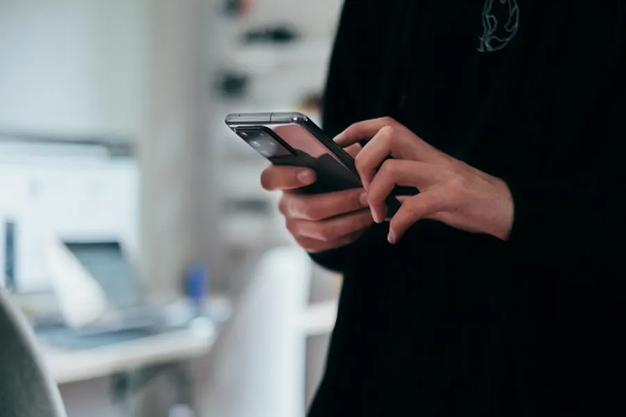 Hands using a smartphone